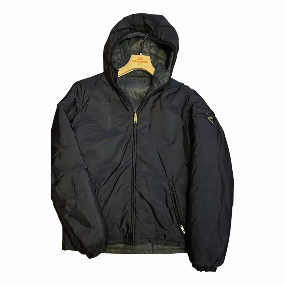 Prada Reversible Plaque Puffer Jacket