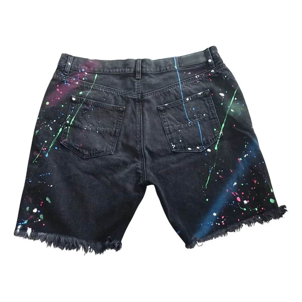 AMIRI Thrasher Paint Splatter Distressed Denim Shorts