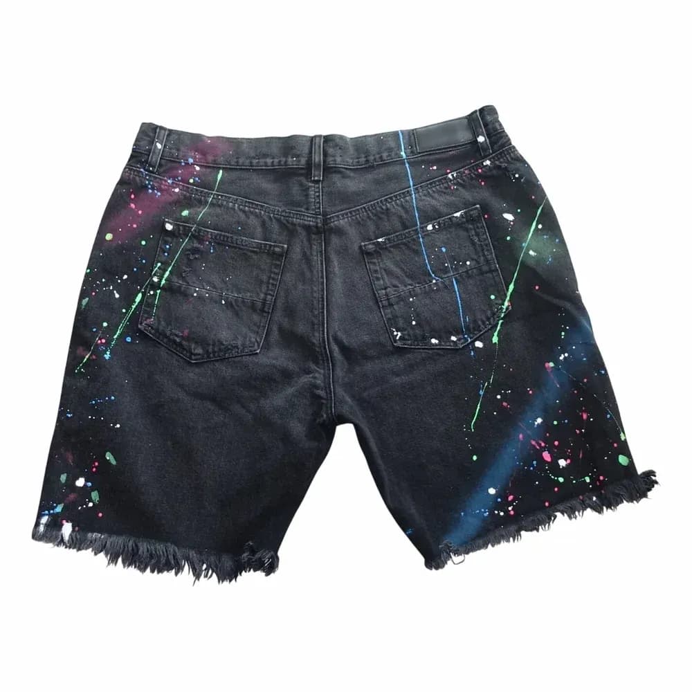 AMIRI Thrasher Paint Splatter Distressed Denim Shorts
