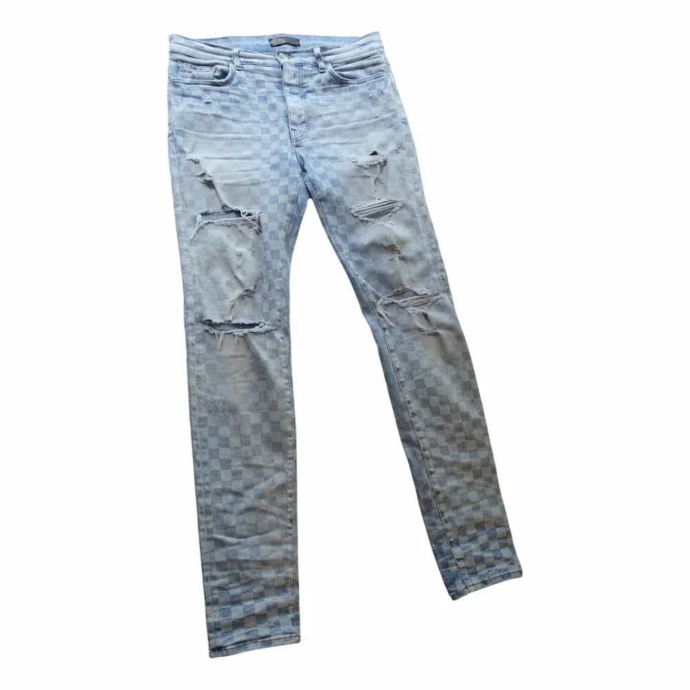 AMIRI Thrasher Laser Check Skinny Jeans