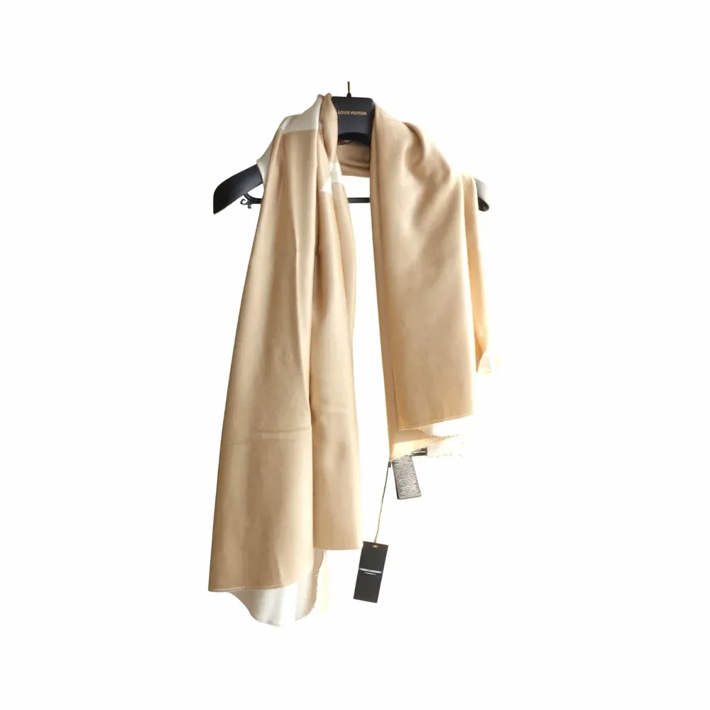 Saint Laurent Beige pashmina halsduk vävd i diamantmönster