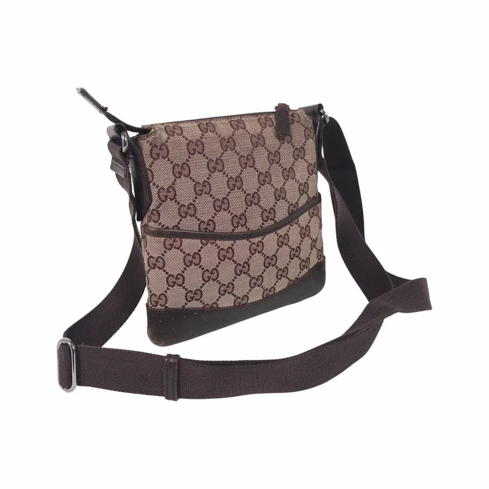 Gucci Small GG Canvas Perforated Messenger Bag